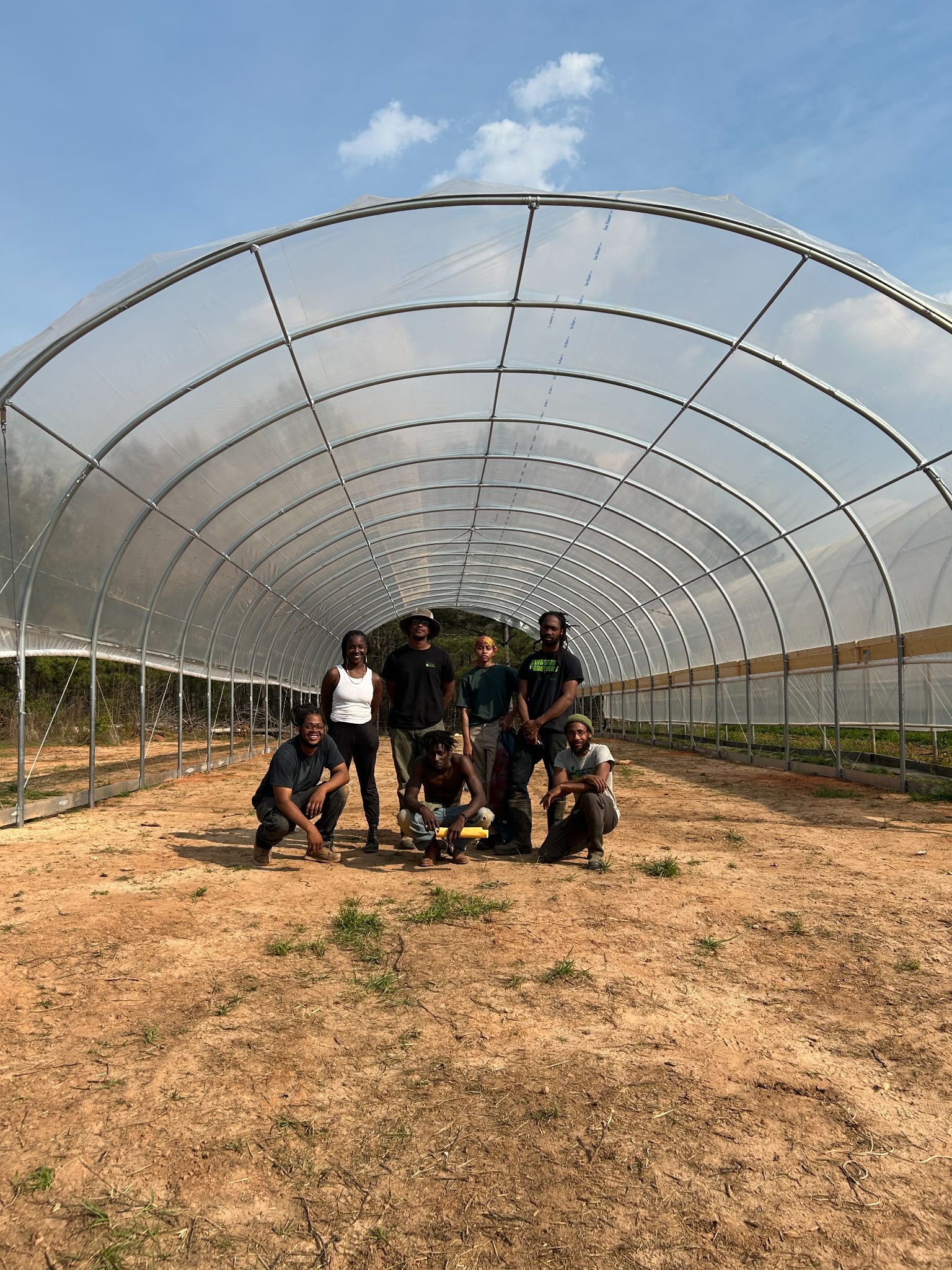 EP Crew builds 30x96 High Tunnel at Love is Love Cooperative Farm, Mansfiled, GA. Photo by Demetrius Milling