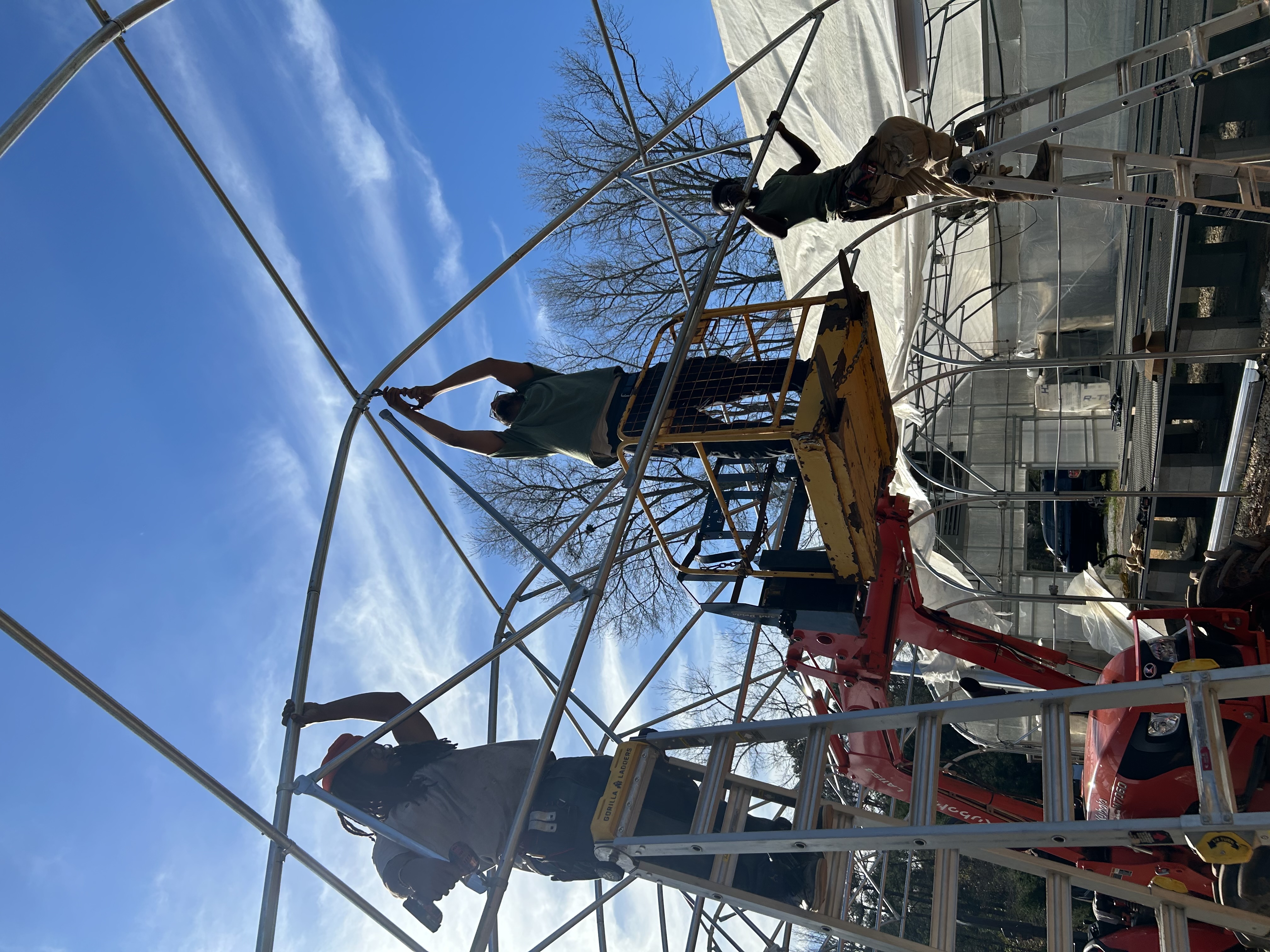 EP Crew building Greenhouse. Photo by Charles Greenlea